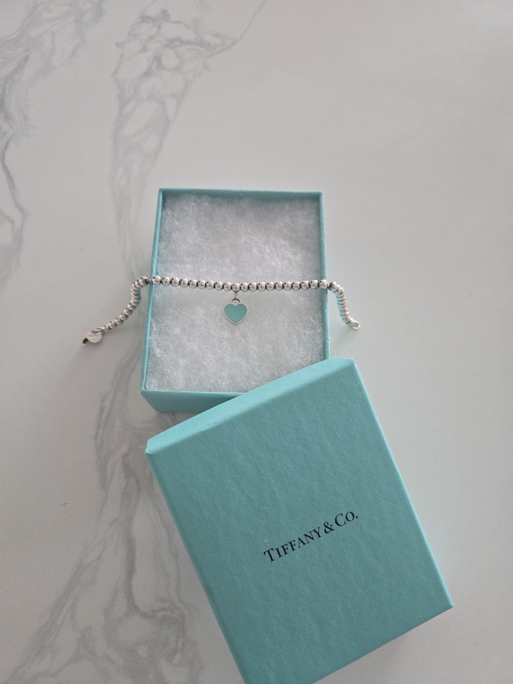 Tiffany & Co. Silver Bead Bracelet with Blue Heart Charm 7"